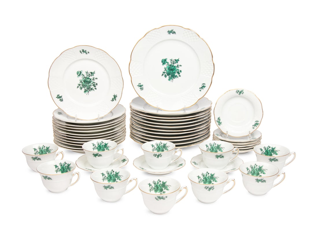 A Vista Allegre Porcelain Dinner Service: A Vista Allegre Porcelain Dinner Service Portugal, 20th Century Green Rose pattern, comprising: 12 dinner plates 12 salad plates 10 teacups 9 saucers; 43 items total. Diameter of dinner plates 10 inch
