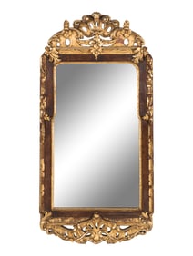 A Scandinavian Rococo Walnut and Parcel-Gilt Mirror