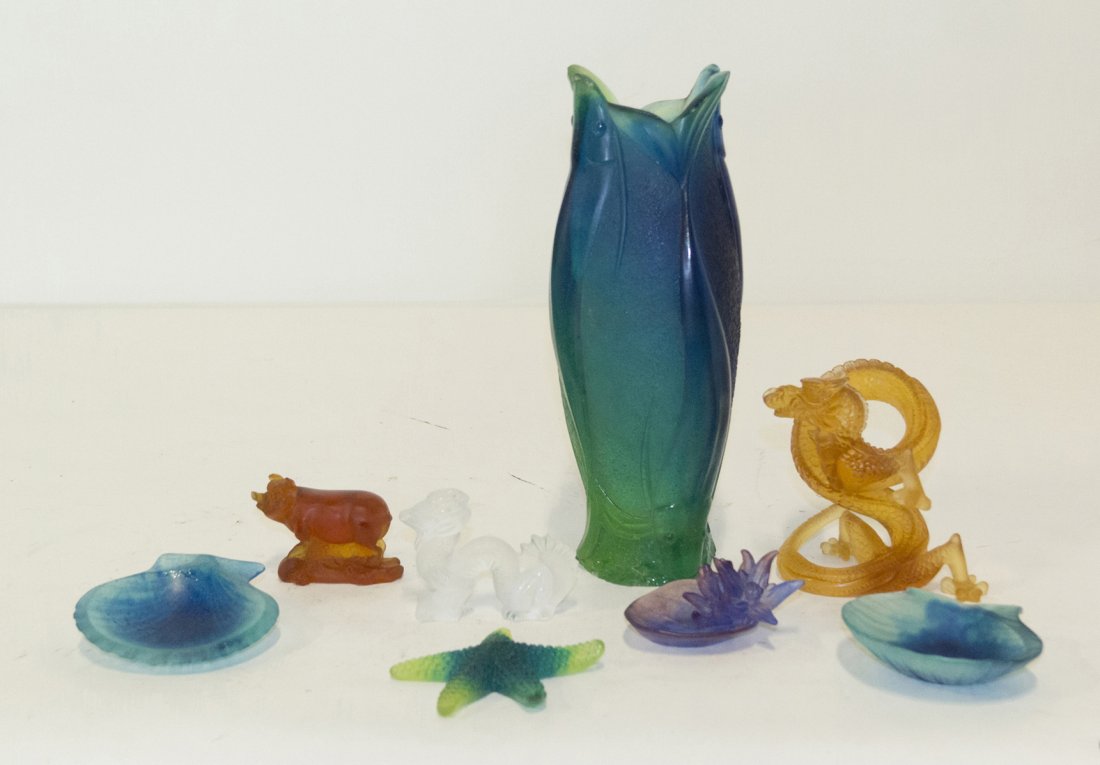 A Group of Eight Daum Glass Articles, Height of vase 11: A Group of Eight Daum Glass Articles, comprising a starfish, two shells, a pig, a lily pad, a dragon and a vase modeled with stylized fish, together with a Lalique dragon. Height of vase 11 1/2 inches