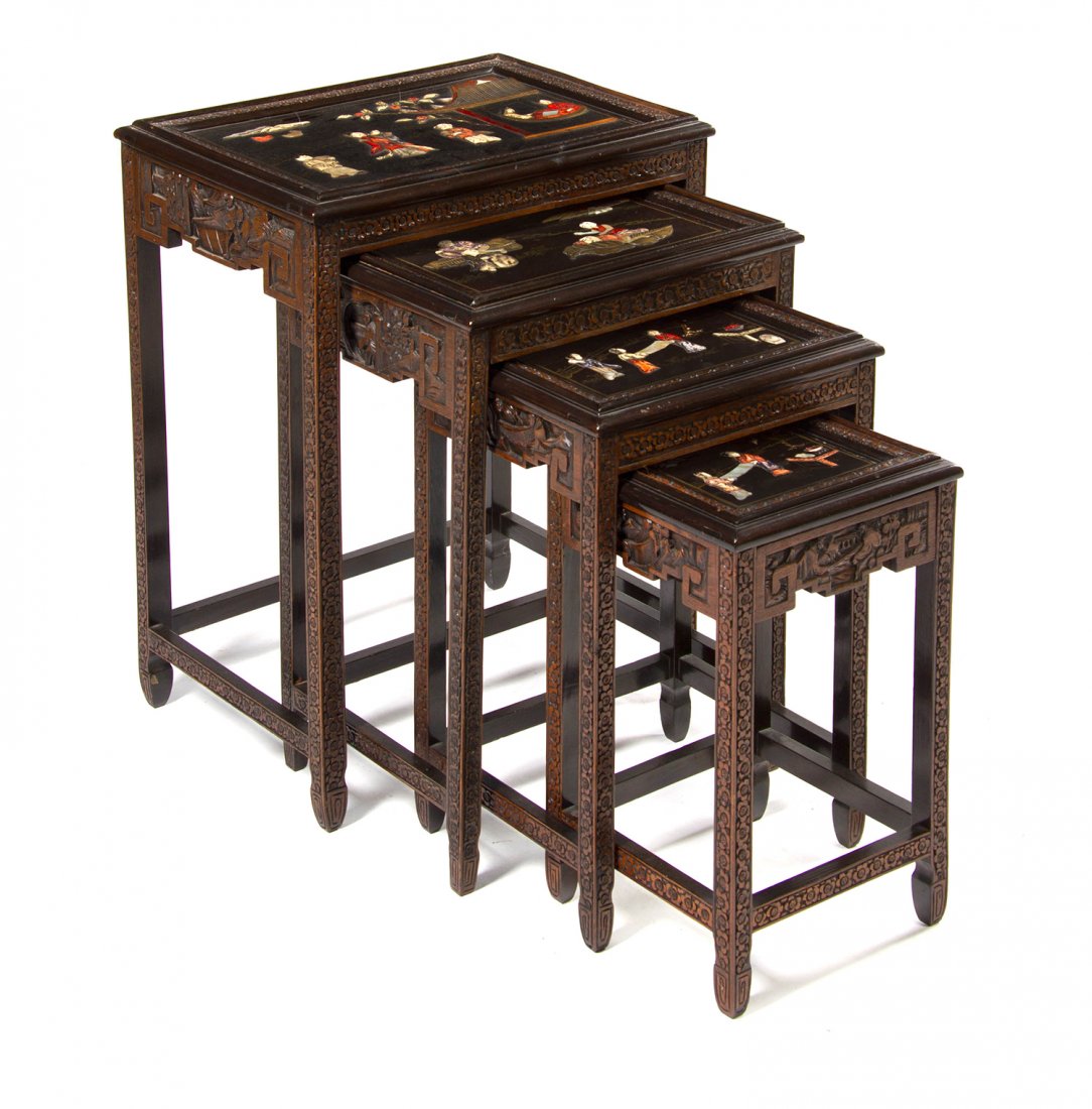 A Set of Four Chinese Mother-of-Pearl Inset Nesting Tab: A Set of Four Chinese Mother-of-Pearl Inset Nesting Tables, each having a rectangular top, decorated with figural scenes set in foliate carved frames, raised on conforming legs joined by stretchers. H