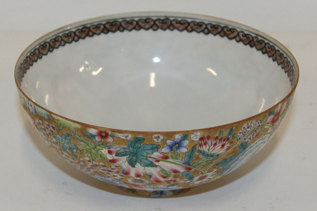 A Chinese Eggshell Porcelain Footed Bowl, Diameter 5 1/: A Chinese Eggshell Porcelain Footed Bowl, having millefleur decoration on a gilt ground, the interior with a pitted dragon to the center, the underside bearing apocryphal Qianlong mark. Diameter 5 1/8