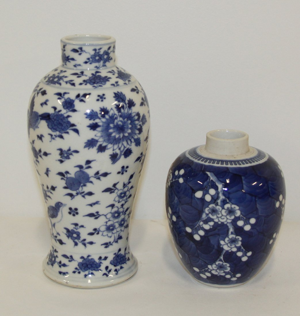 A Chinese Blue and White Ginger Jar, Height of tallest : A Chinese Blue and White Ginger Jar, decorated with hawthornes, together with a blue and white baluster vase, with floral decoration. Height of tallest 7 1/2 inches.