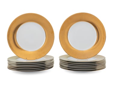 A Set of Sixteen Christofle Porcelain Chargers