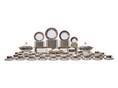 A Tharaud-Limoges Parcel Gilt and Cobalt Decorated Porcelain Dinner Service