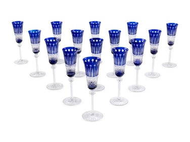 A Set of Fifteen Saint-Louis Cobalt Cut-to-Clear Champagne Flutes