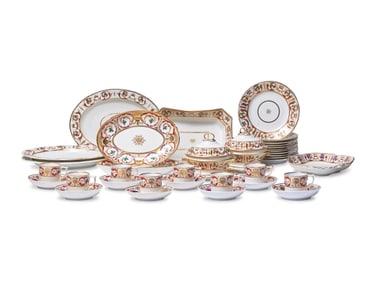 A Derby Parcel Gilt and Polychrome Armorial Porcelain Dinner Service