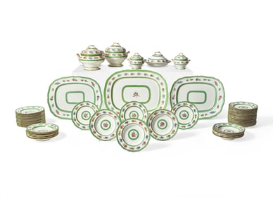 An English Floral Decorated and Parcel Gilt Creamware Dinner Service