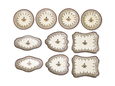 An English Creamware Part Dinner Service Bearing an Armorial Crest