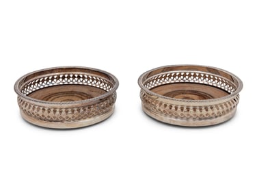 A Pair of Continental Silver-Plate Mounted Wine Coasters