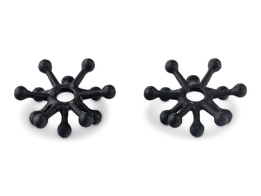 A Pair of Danish Modernist Cast Iron Candle Holders