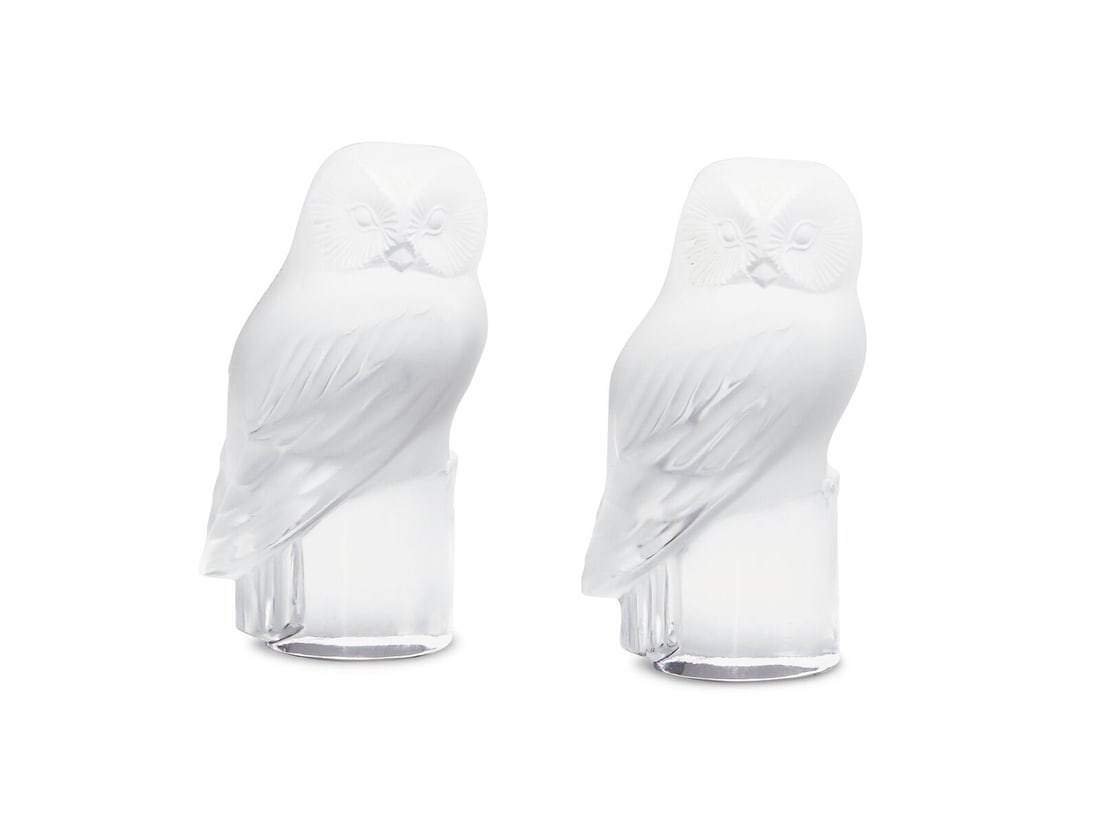 Two Lalique Chouette Glass Owl Figures: Two Lalique Chouette Glass Owl Figures Second Half 20th Century each signed 'Lalique France' in etch to base. Height 3 5/8 inches. This lot is located in Philadelphia.