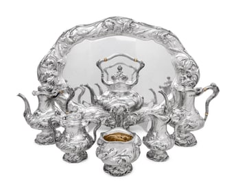 An American Silver Repoussé Eight-Piece Tea and Coffee Service