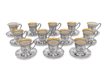 A Set of Twelve American Silver Martelé Coffee Cups and Saucers