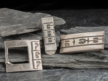 Frank Patania, Sr.  (American, 1899-1964) Monogrammed Sterling Silver Belt Buckles and Money Clip
