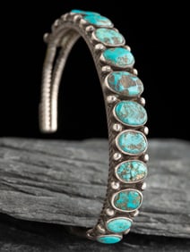 Navajo Twisted Wire and Thirteen Turquoise Stone Cuff Bracelet