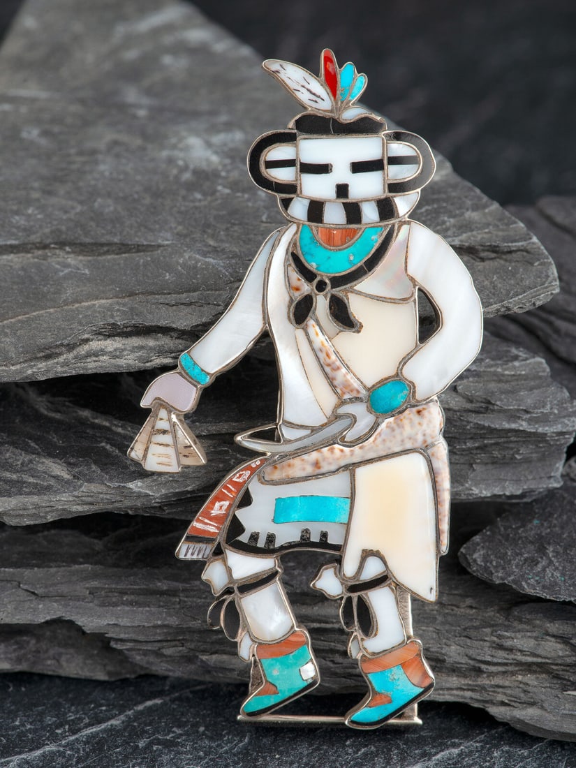 Leonard Martza (Zuni, b. 1928, act. since late 1940s) Mosaic Inlay Katsina Figure: Leonard Martza (Zuni, b. 1928, act. since late 1940s) Mosaic Inlay Katsina Figure marked LM height 4-3/16 inches x width 2-1/4 inches, weight 29.5 dwt. This lot is located in Cincinnati.
