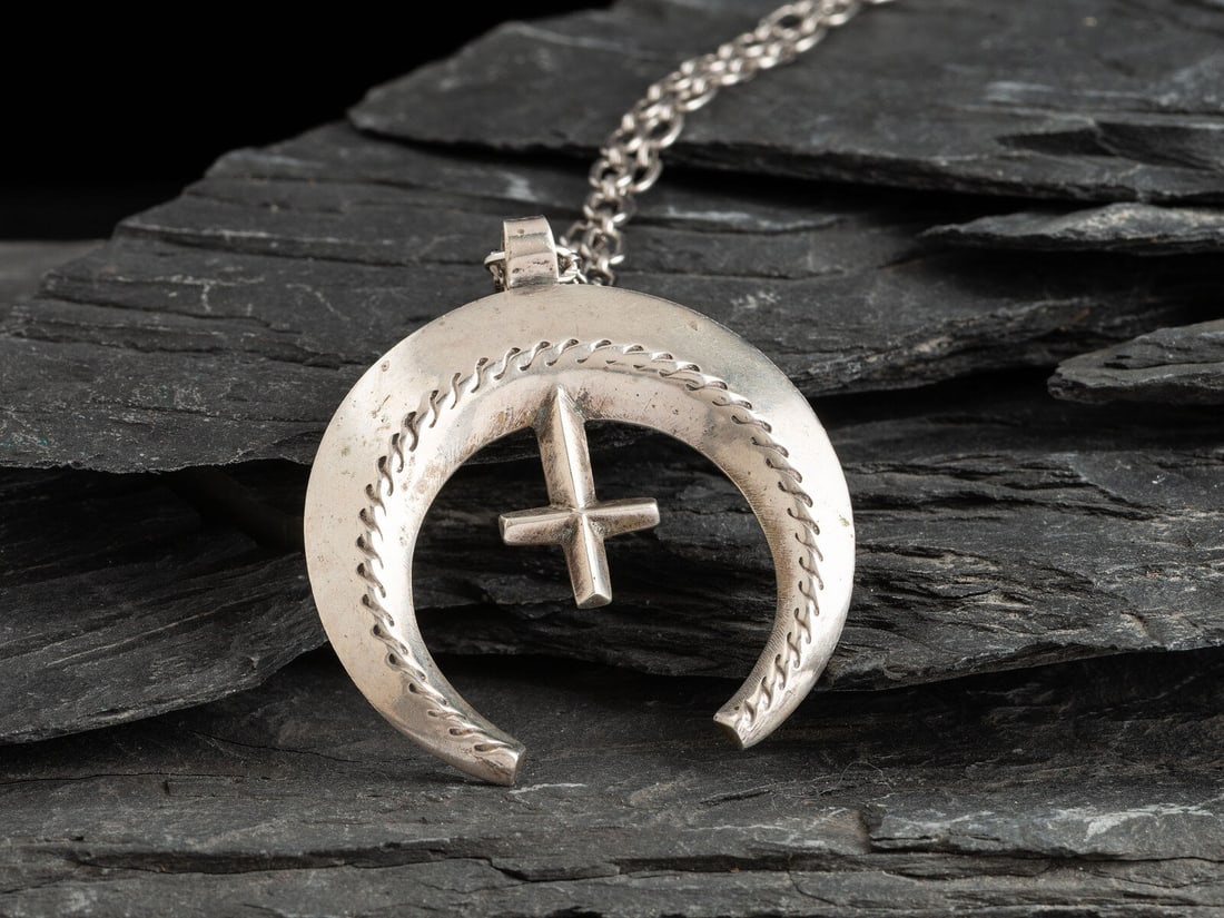 Navajo Arts and Crafts Guild (Institution, formed 1941) Navajo Sandcast Naja Necklace (1 of 2)