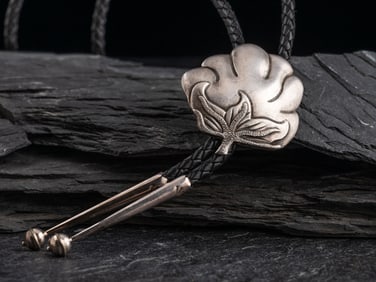 Kenneth Begay  (Diné, 1913-1977) Sterling Silver Cotton Bolo Tie