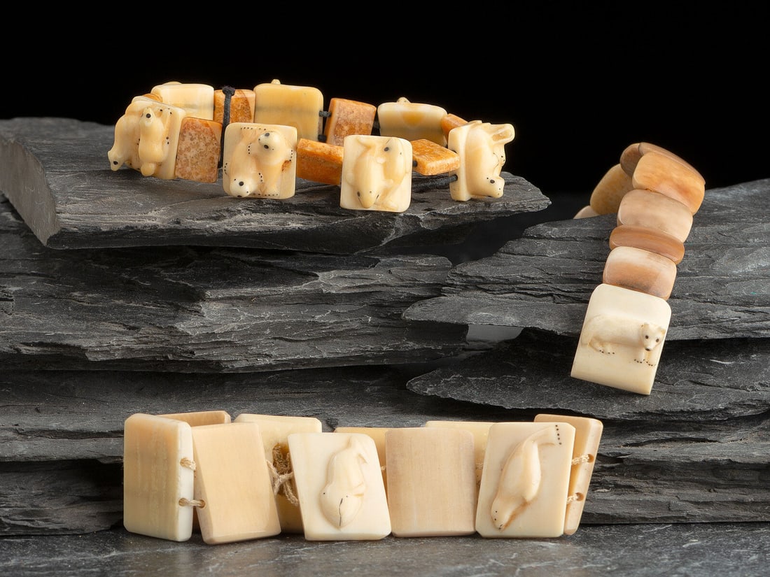 Lincoln Milligrock (Iñupiaq, 1931-2010) Inuit Bracelets: Lincoln Milligrock (Iñupiaq, 1931-2010) Inuit Bracelets lot of 3 includes: one with carved animals in relief, including bear, walrus, seal, whale, and dolphin; signed by Lincoln Milligrock width 