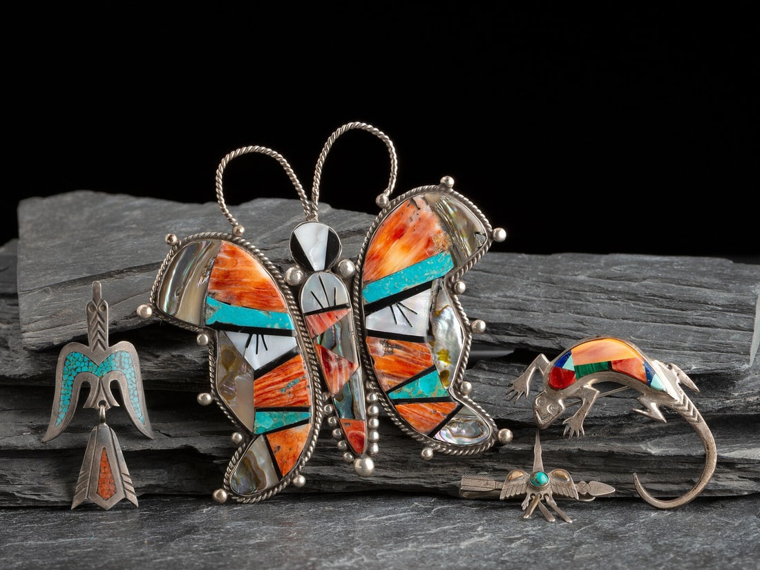 Navajo and Zuni Silver Figural Pins/Pendants: Navajo and Zuni Silver Figural Pins/Pendants second half 20th century lot of 4, includes: a large butterfly pin/pendant set with jet shell, abalone, spiny oyster, and turquoise; marked STERLING CP len