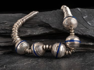 Gibson Nez (Jicarilla Apache-Diné, 1947-2007) Silver and Lapis Graduated Navajo Pearl Necklace