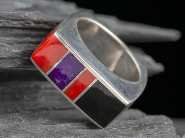 Charles Supplee  (Hopi, 1959-2021) Sterling Silver, Coral, Onyx, and Sugilite Squared Ring