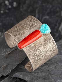 Darryl Dean Begay (Diné, b. 1973) Tufa Cast Sterling Silver, Turquoise, and Coral Figural Cuff