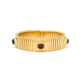 BULGARI, YELLOW GOLD AND MULTIGEM 'TUBOGAS' CUFF BRACELET