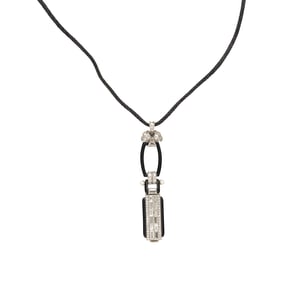 ART DECO, DIAMOND, SEED PEARL, ENAMEL, AND ONYX PENDANT WATCH