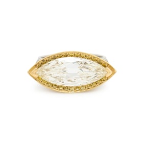 EAST-WEST MARQUISE CUT DIAMOND AND YELLOW DIAMOND RING