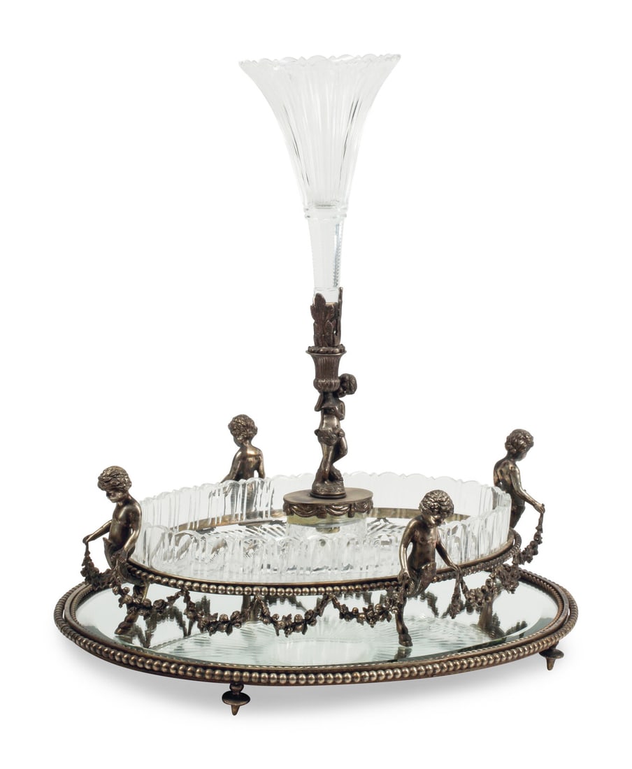 A Baccarat Silvered Bronze and Cut Glass Table Centerpiece: A Baccarat Silvered Bronze and Cut Glass Table Centerpiece 19th Century stamped Baccarat France to the interior of the bronze mount Height 22 1/2 x width 21 x depth 15 inches. This lot is located in C