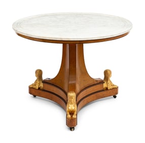 A Charles X Amboyna, Amaranth and Parcel Gilt Marble-Top Center Table