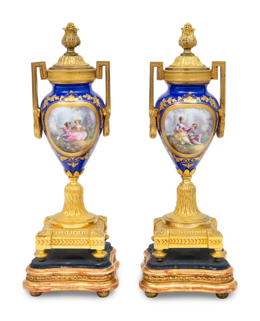 A Pair of Sèvres Style Porcelain and Gilt-Bronze Mounted Cassolettes: A Pair of Sèvres Style Porcelain and Gilt-Bronze Mounted Cassolettes 19th Century Height 11 1/2 inches. This lot is located in Palm Beach.