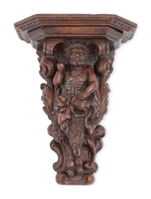 A Swiss Black Forest Carved Wall Bracket