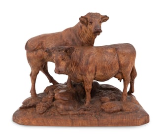 A Swiss Black Forest Carved Bull and Cow Group