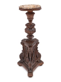 An Italian Carved Walnut Tripartite Pedestal