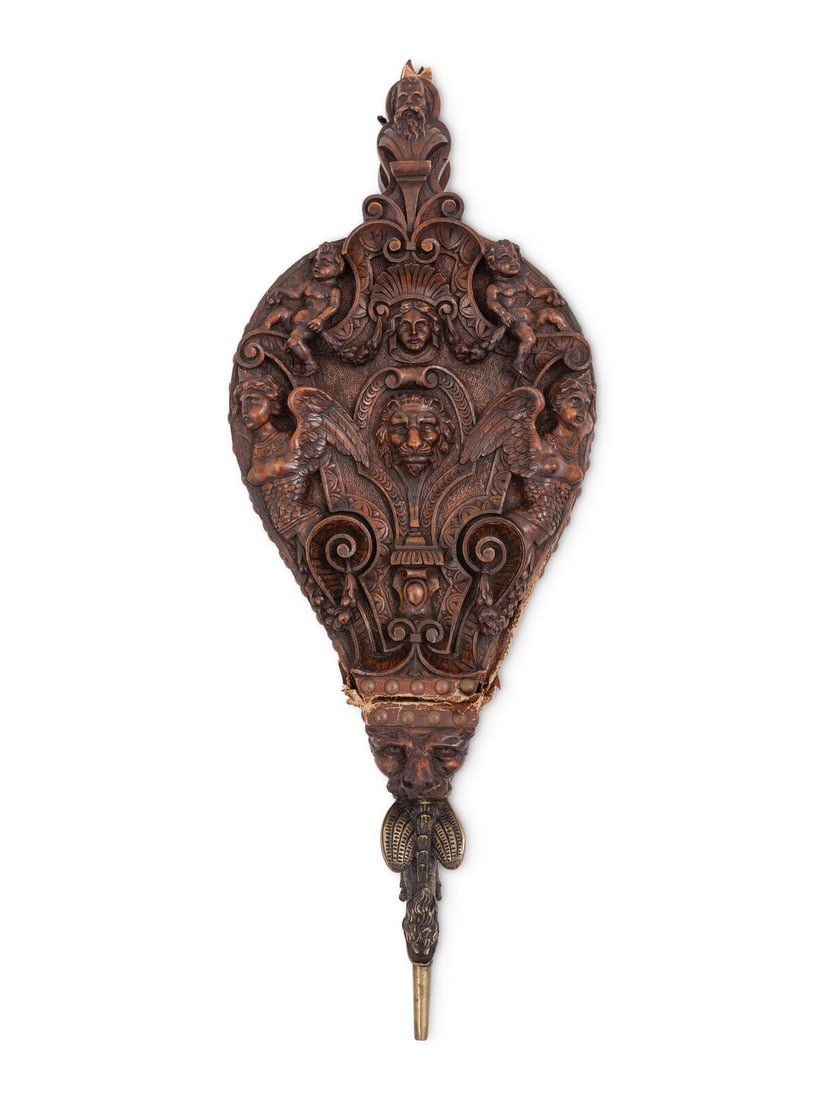 An Italian Carved Walnut Bellows: An Italian Carved Walnut Bellows 19th Century Height 27 x width 10 1/2 inches. This lot is located in Palm Beach.