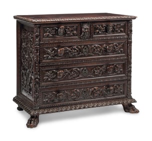 An Italian Renaissance Style Mahogany Chest of Drawers