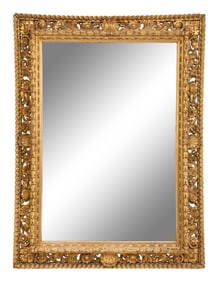An Italian Baroque Style Giltwood Mirror