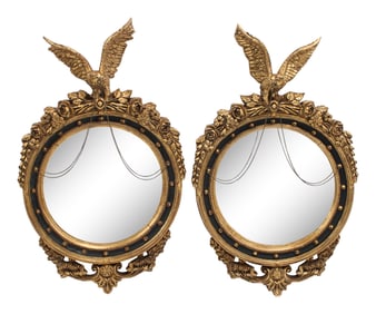 A Pair of Regency Style Ebonized and Parcel-Gilt Mirrors