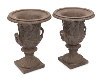 A Pair of Victorian Relief Decorated Cast Iron Garden Urns