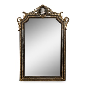 A Victorian Ebonized and Parcel-Gilt Mirror
