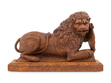 A Carved Oak Newel Post Figure of a Lion