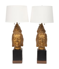 A Pair of Gilt Composition Buddha Lamps