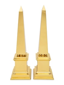 A Pair of Polished Brass Obelisks
