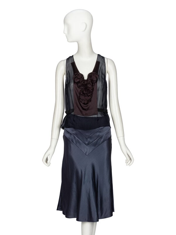Chloé, Silk Blouse & Skirt: Chloé, Silk Blouse & Skirt BLOUSE Sleeveless blouse in sheer navy silk chiffon with a black silk charmeuse panel & rosette details at front. V-neckline. Pleats at center back. Bla