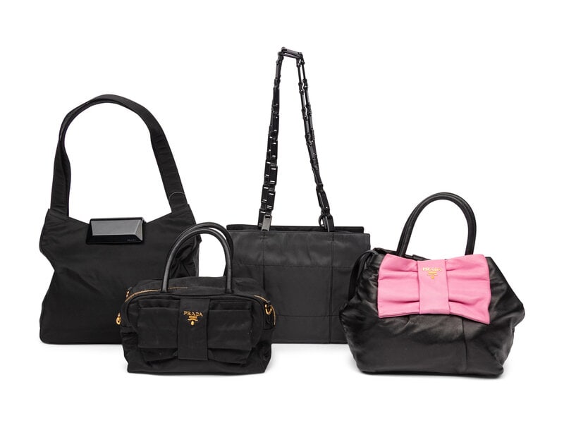 Prada, Four Handbags: Prada, Four Handbags THE FIRST Shoulder bag in black nylon. Black composite magnetic closure and flay nylon straps. Label: Prada Date: 1990's-2000's Country of Origin: Italy <