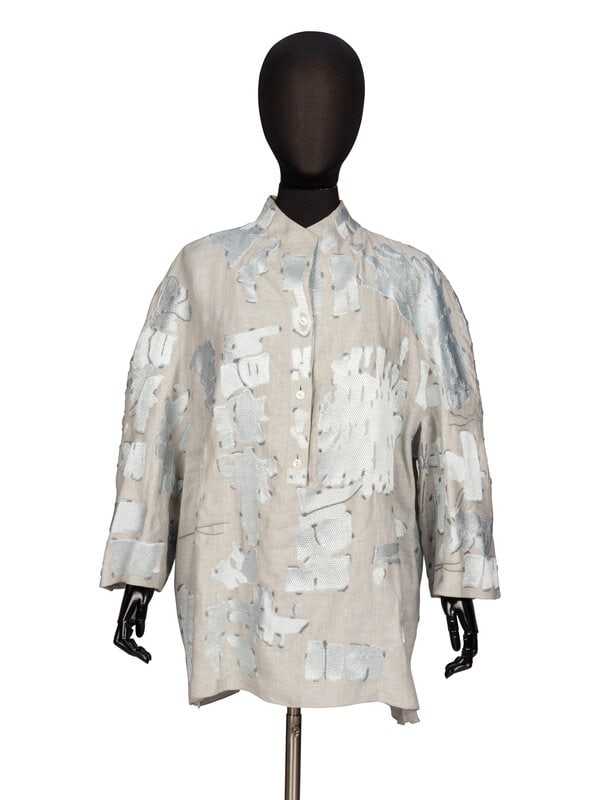 Ralph Rucci, Embellished Tunic Blouse: Ralph Rucci, Embellished Tunic Blouse Tunic in dove grey linen with pale blue embroidery and bead embellishments throughout. Built-up collar. Incorporated three-quarter-length sleeves. Button clo