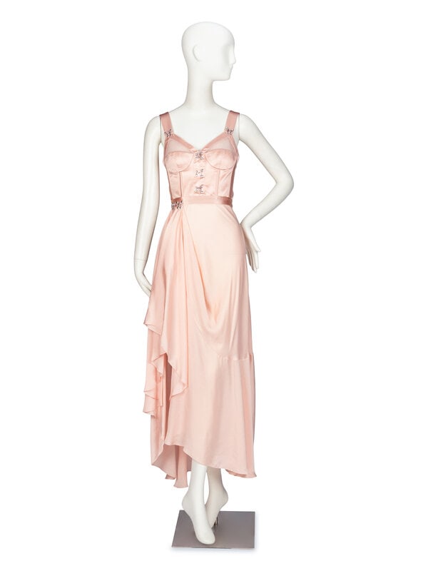 Alexander McQueen, Satin Corset Dress: Alexander McQueen, Satin Corset Dress As seen in look #26 of the Pre-Fall 2022 collection lookbook by Sarah Burton for Alexander McQueen. Corset dress in pale pink cotton/silk-blend satin.