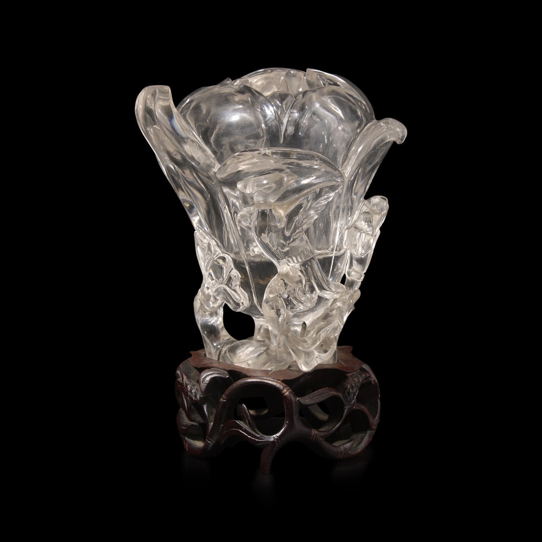 A Chinese Rock Crystal 'Magnolia' Vase with wood stand, 19th Century 清晚期